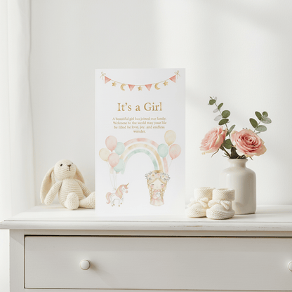 Baby girl card in nursery setting with soft decor